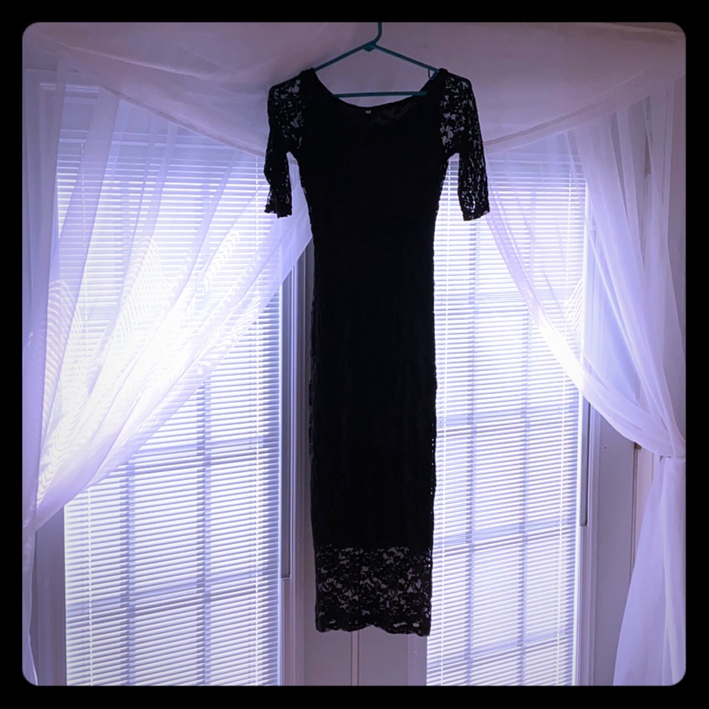 Beautiful black lace overlay body con dress.